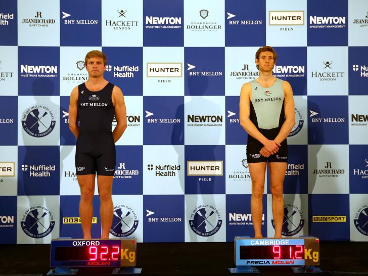 Stroke-seats Constantine Louloudis of Oxford and Henry Hoffstot of Cambridge weigh-in